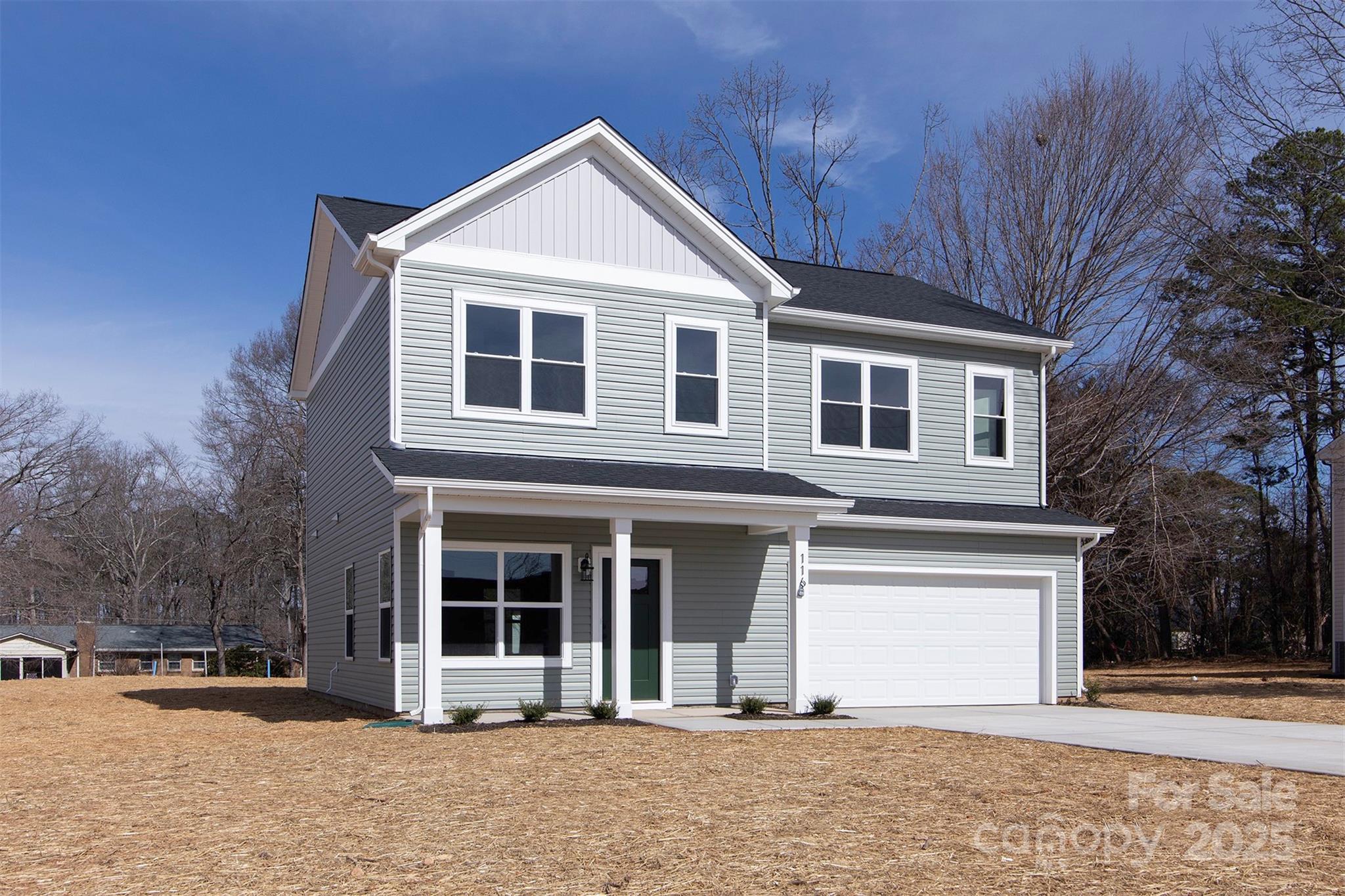 116 Durham Road Stanley, NC 28164 - Photo 2 of 25 a front view of a house with a yard