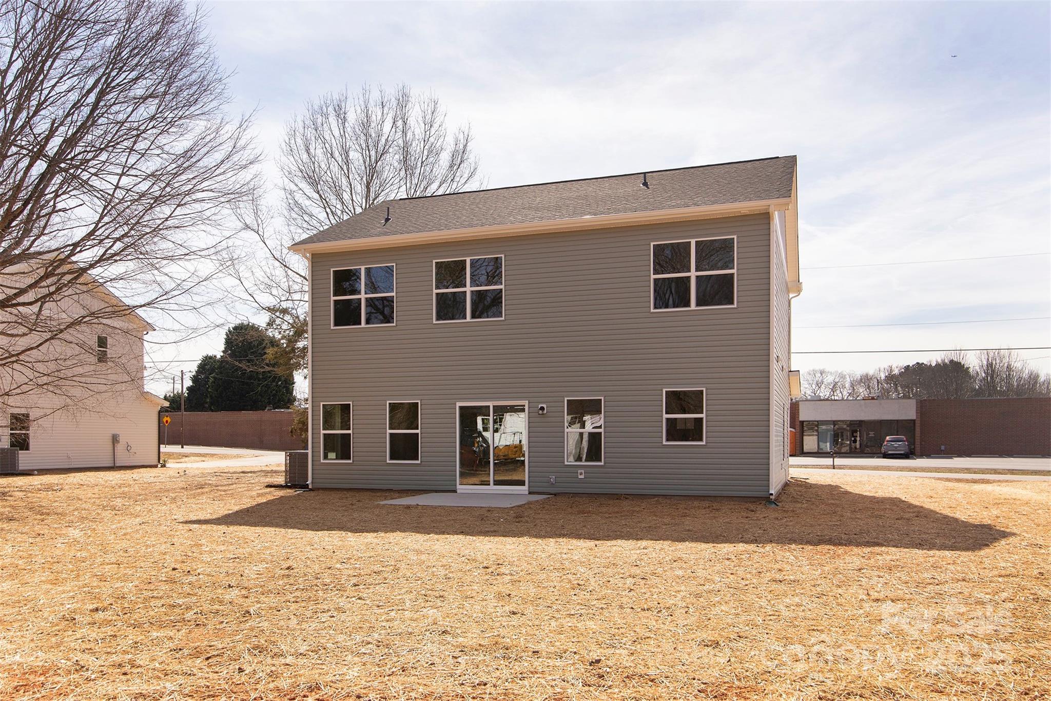116 Durham Road Stanley, NC 28164 - Photo 23 of 25 a front view of a house with a yard