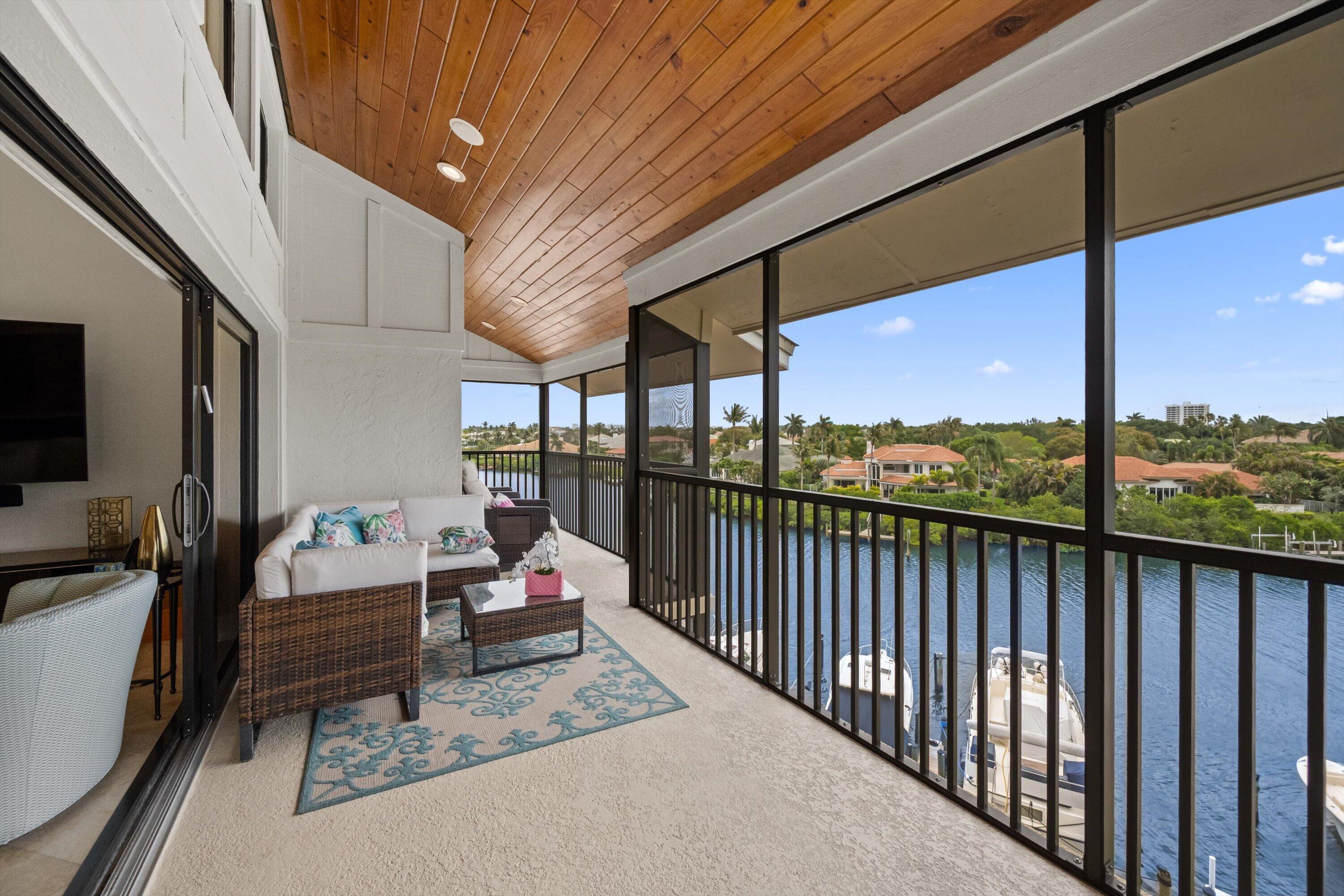 16910 Bay Street, Unit E 502 Jupiter, FL 33477 - Photo 26 of 43 a outdoor space with furniture