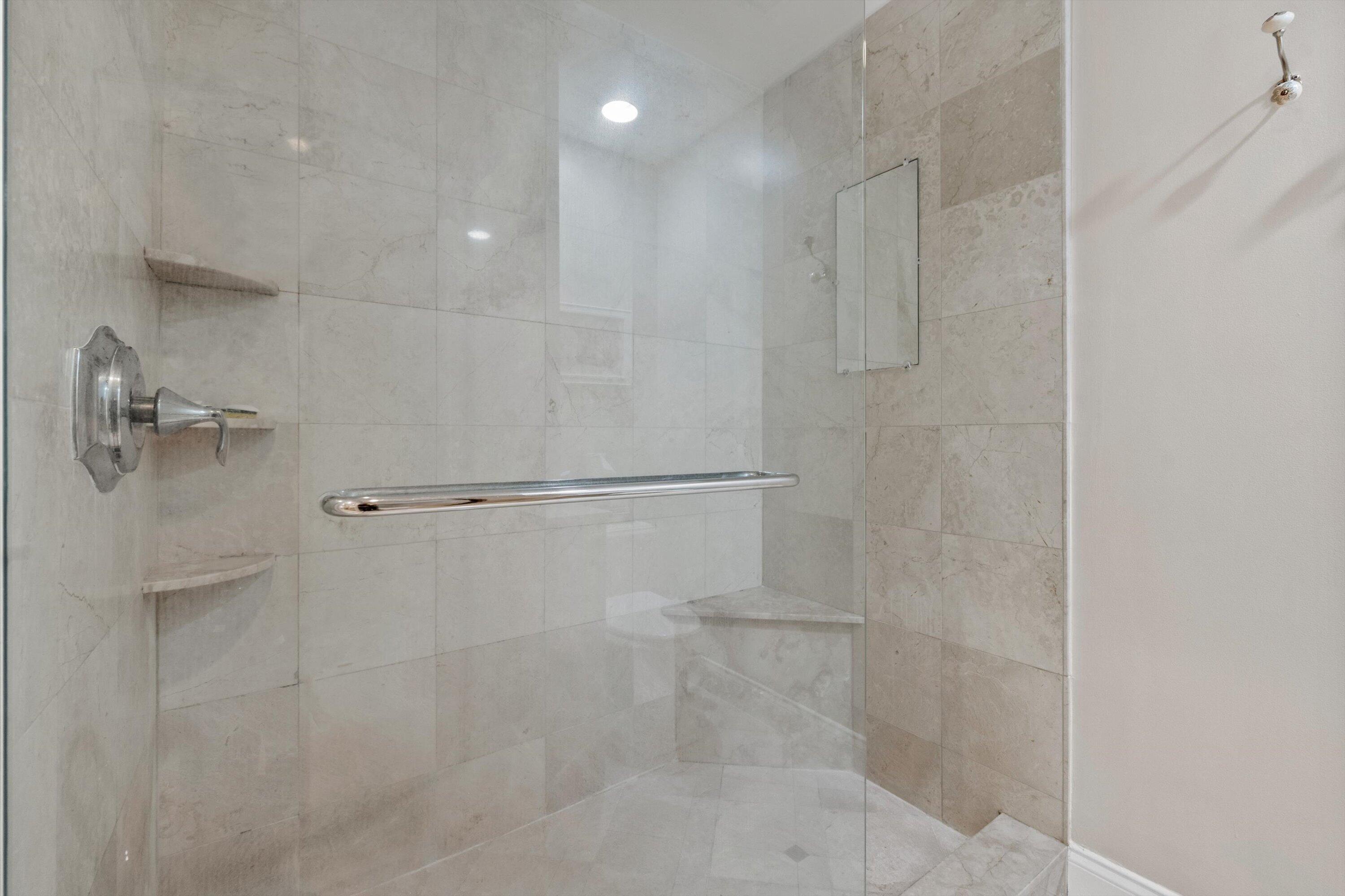 16910 Bay Street, Unit E 502 Jupiter, FL 33477 - Photo 36 of 43 a bathroom with a shower