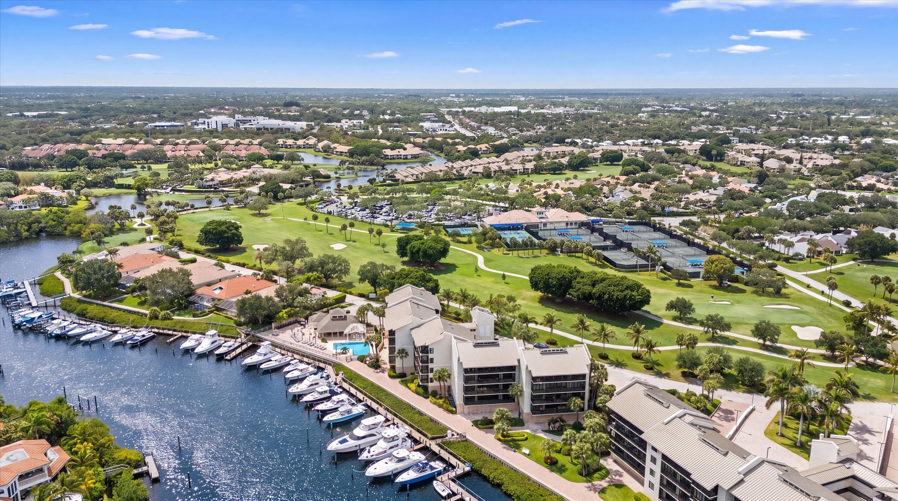16910 Bay Street, Unit E 502 Jupiter, FL 33477 - Photo 39 of 43 an aerial view of residential houses with outdoor space