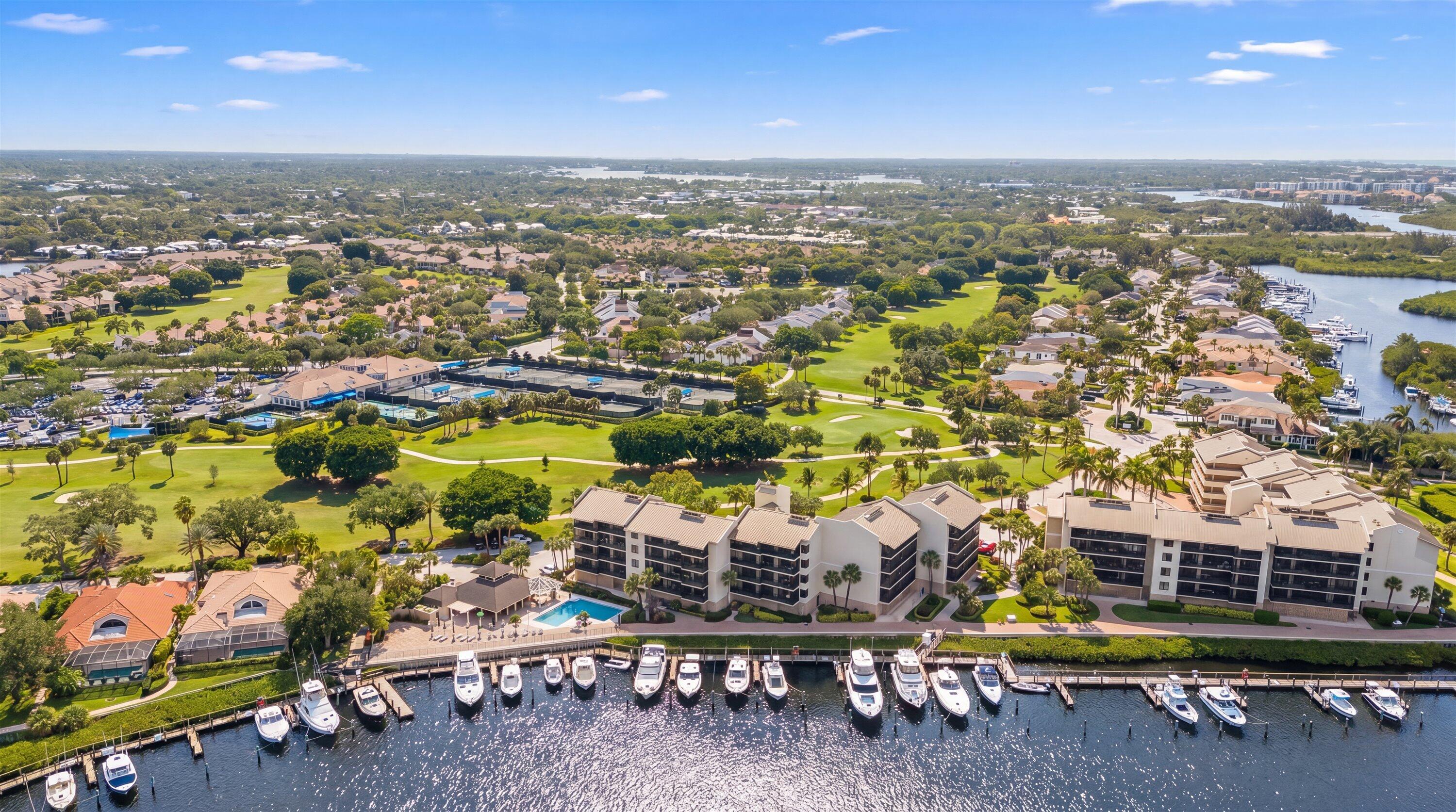 16910 Bay Street, Unit E 502 Jupiter, FL 33477 - Photo 41 of 43 an aerial view of residential houses with outdoor space