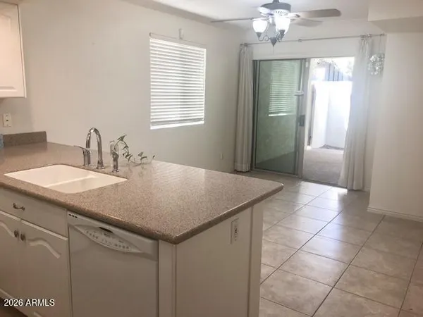 a bathroom with a sink vanity and a mirror