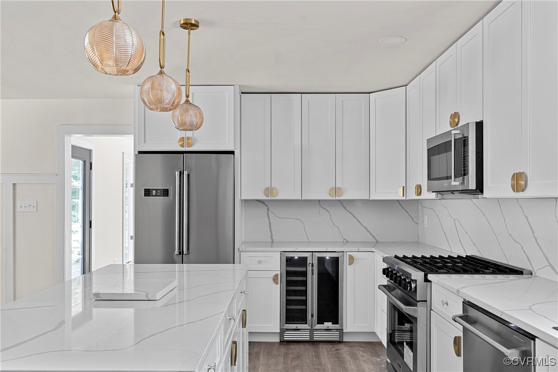 113 Rappa Run Road Topping, VA 23169 - Photo 12 of 49 Kitchen with high end appliances, beverage cooler,