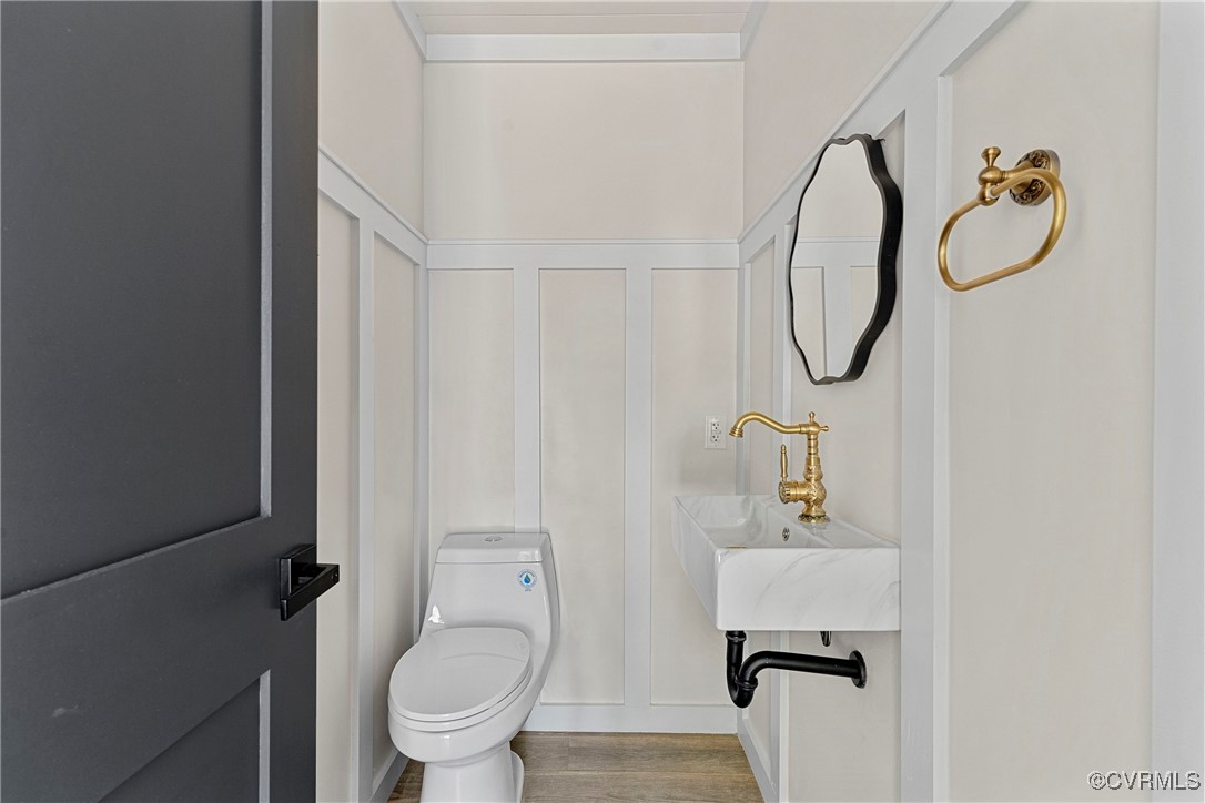 113 Rappa Run Road Topping, VA 23169 - Photo 20 of 49 Bathroom with toilet and wood finished floors