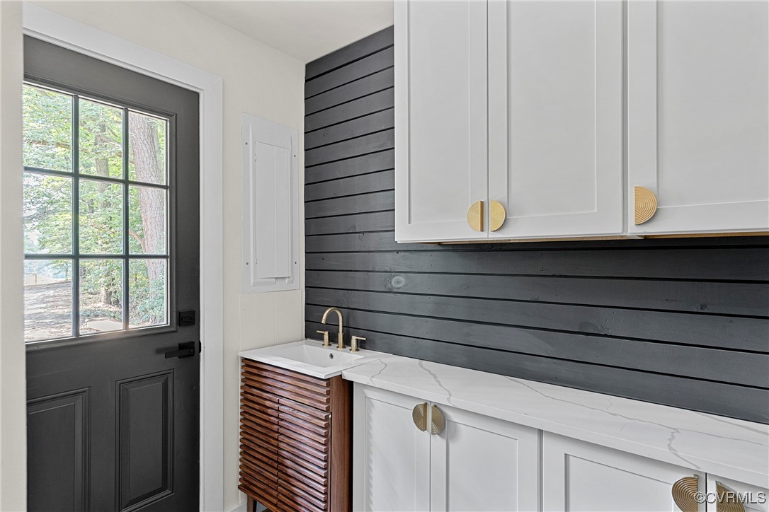 113 Rappa Run Road Topping, VA 23169 - Photo 21 of 49 Bar area featuring wooden walls and plenty of natu