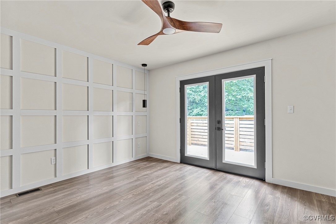 113 Rappa Run Road Topping, VA 23169 - Photo 24 of 49 Spare room featuring french doors, light wood-type
