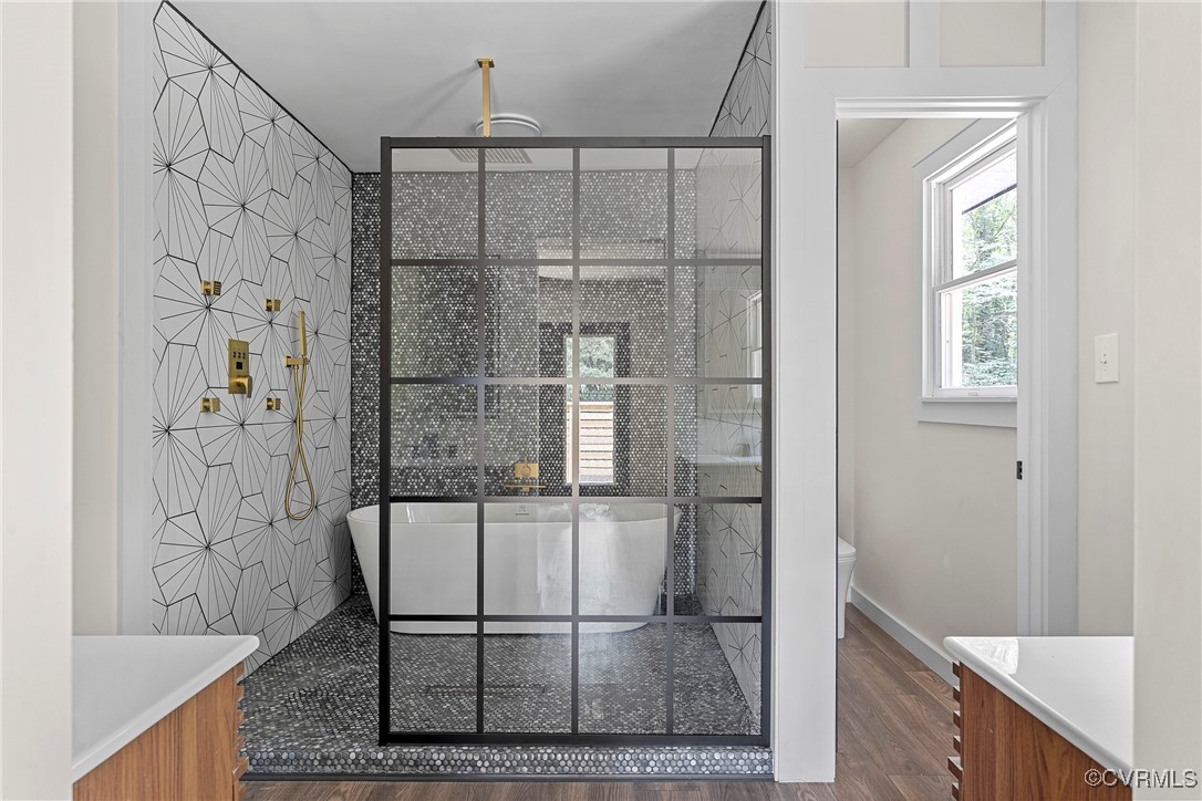 113 Rappa Run Road Topping, VA 23169 - Photo 25 of 49 Full bath with vanity, a freestanding tub, wood fi