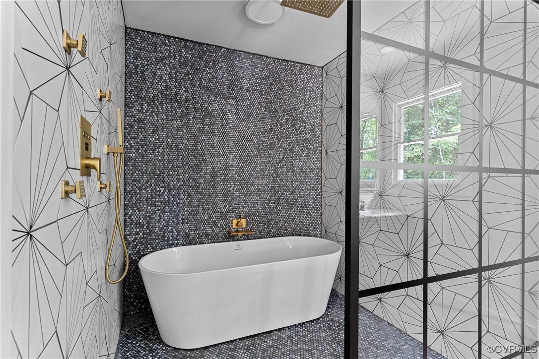 113 Rappa Run Road Topping, VA 23169 - Photo 26 of 49 Full bath featuring tile walls and a freestanding