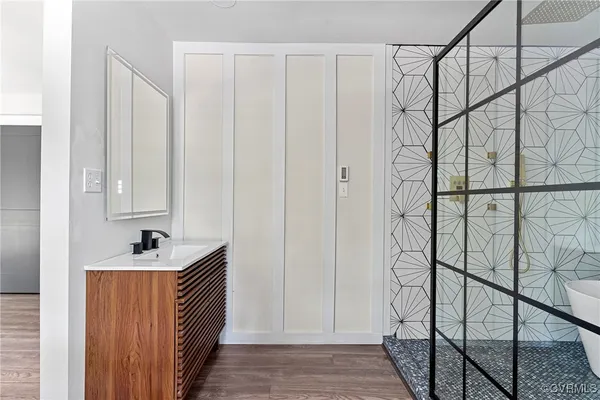 a bathroom with a shower and toilet
