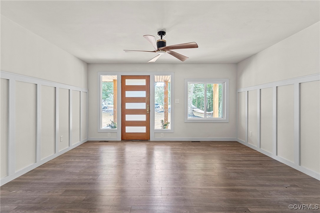 113 Rappa Run Road Topping, VA 23169 - Photo 3 of 49 Foyer entrance with dark wood finished floors and