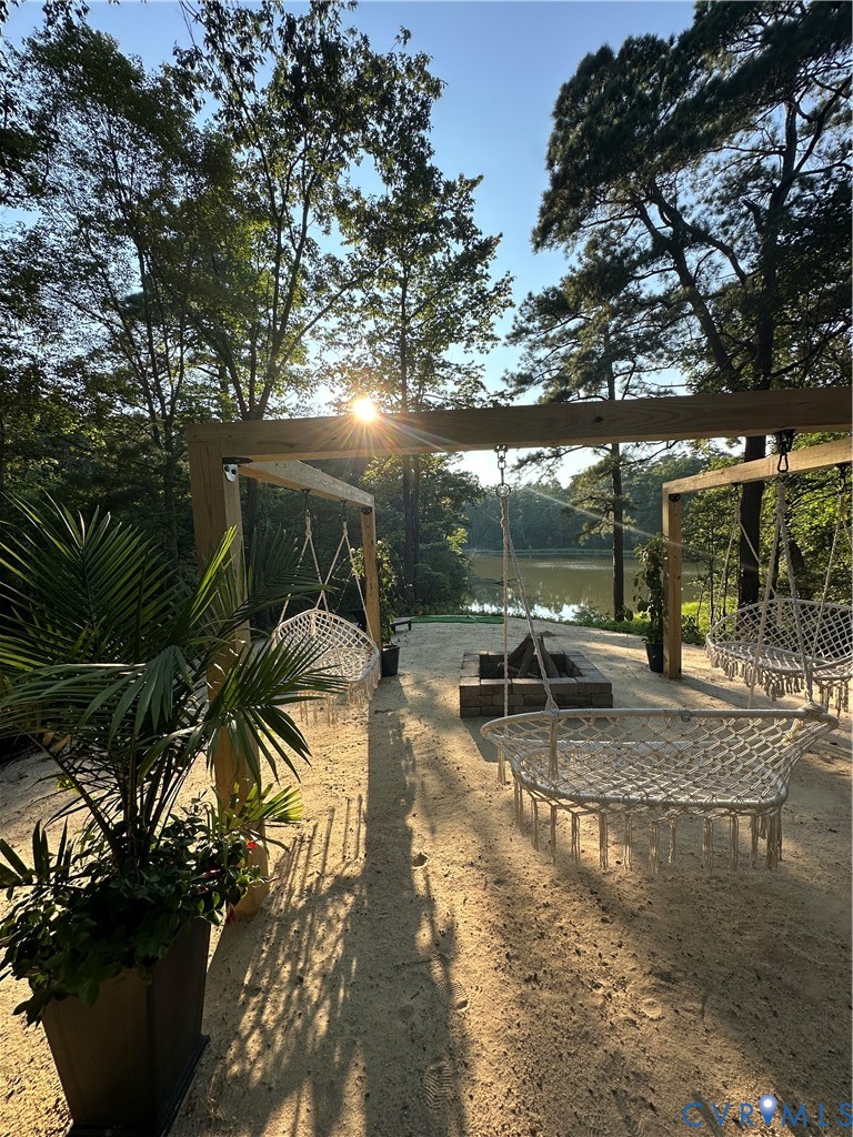 113 Rappa Run Road Topping, VA 23169 - Photo 41 of 49 a view of a swimming pool with a patio
