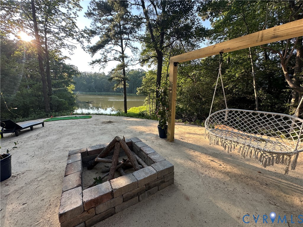 113 Rappa Run Road Topping, VA 23169 - Photo 42 of 49 View of patio / terrace featuring a water view and