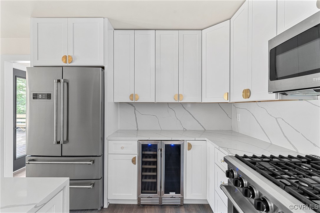 113 Rappa Run Road Topping, VA 23169 - Photo 7 of 49 Kitchen with stainless steel appliances, beverage