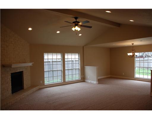 5237 Snowgoose Road Corpus Christi, TX 78413 - Photo 2 of 9 a view of an empty room with a window