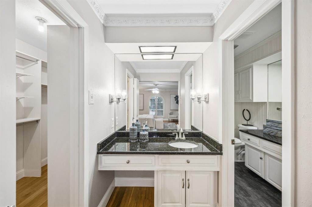 4315 Forest Bend Road Dallas, TX 75244 - Photo 16 of 29 a kitchen with stainless steel appliances granite countertop a sink and cabinets