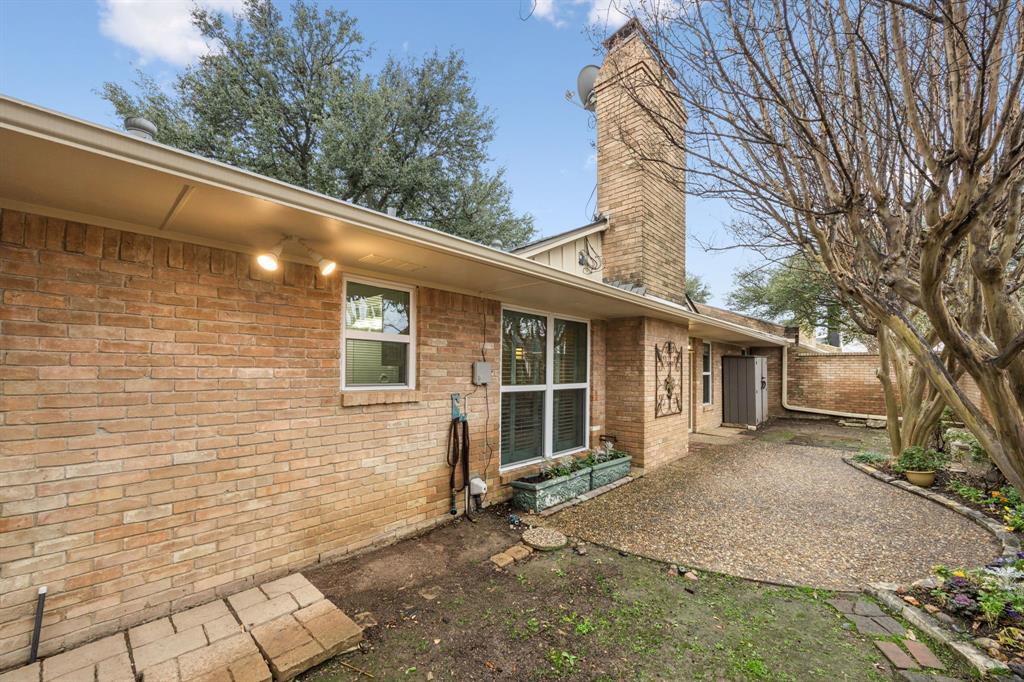 4315 Forest Bend Road Dallas, TX 75244 - Photo 24 of 29 a backyard of a house with seating space