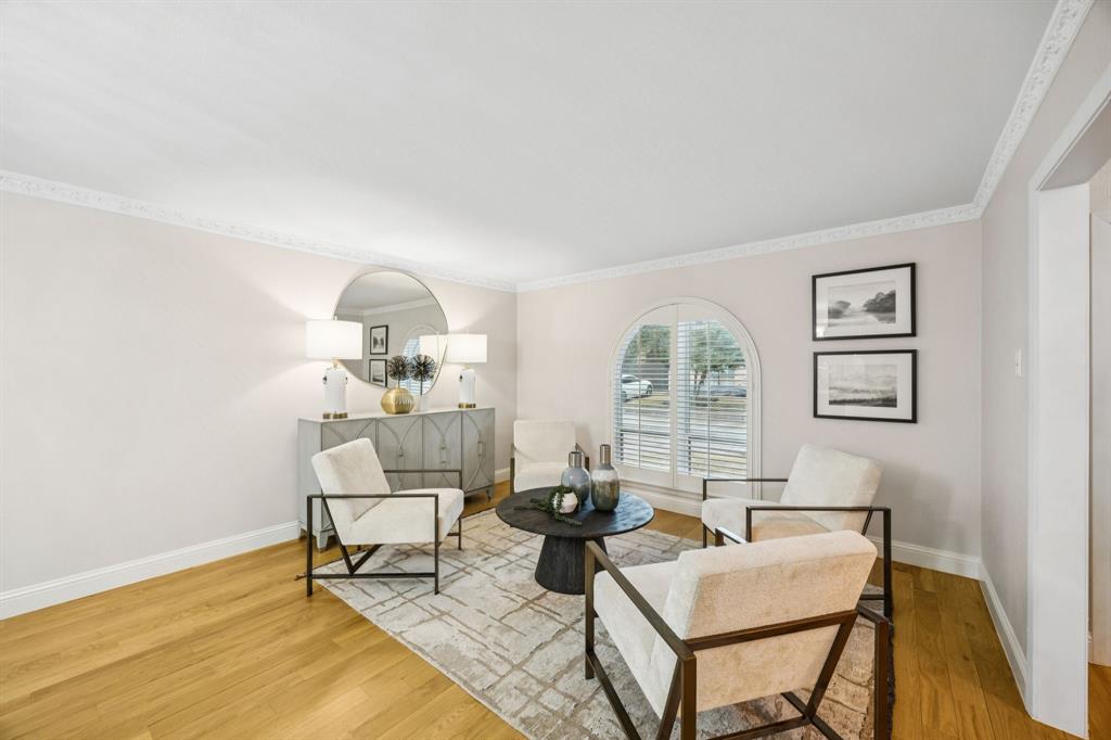 4315 Forest Bend Road Dallas, TX 75244 - Photo 5 of 29 a living room with furniture a table and a large window