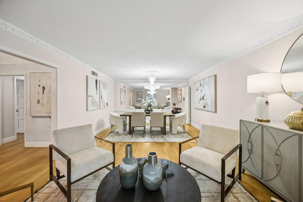4315 Forest Bend Road Dallas, TX 75244 - Photo 6 of 29 a view of a dining room with furniture and wooden floor