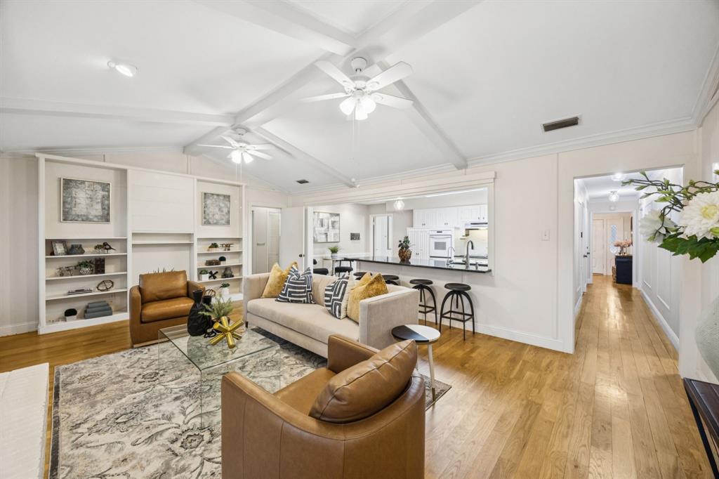 4315 Forest Bend Road Dallas, TX 75244 - Photo 9 of 29 a living room with furniture or couch and a dining table