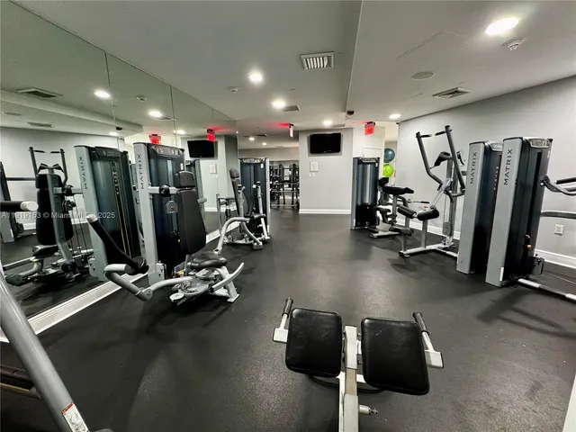 a view of a room with gym equipment