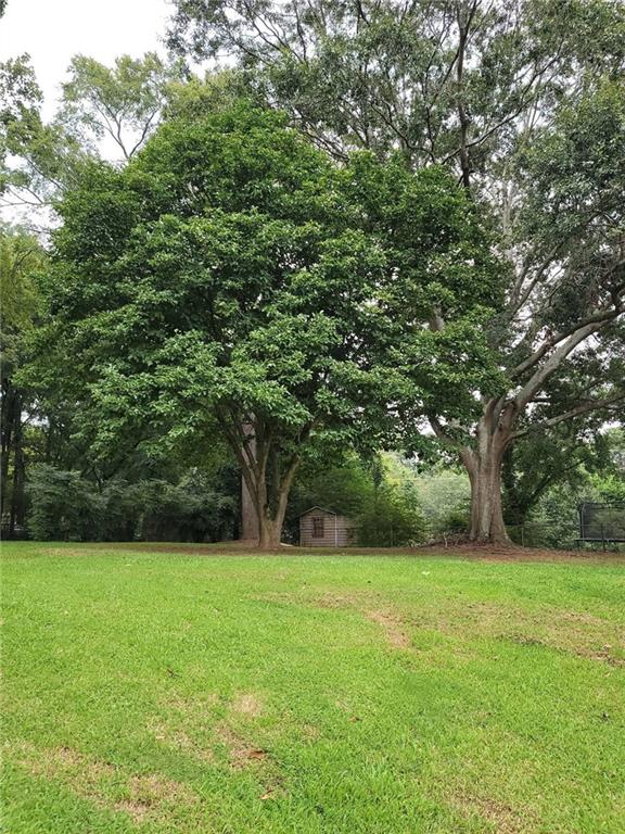 1476 Dupree Road Woodstock, GA 30189 - Photo 11 of 26 a view of a garden