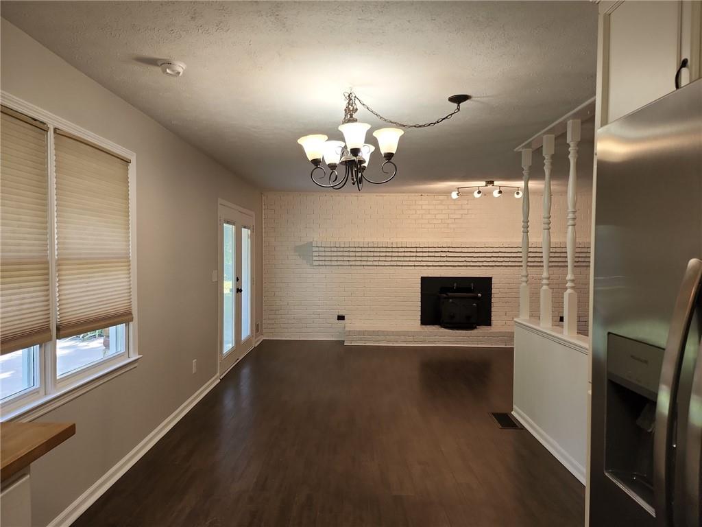 1476 Dupree Road Woodstock, GA 30189 - Photo 14 of 26 a view of a livingroom with a fireplace