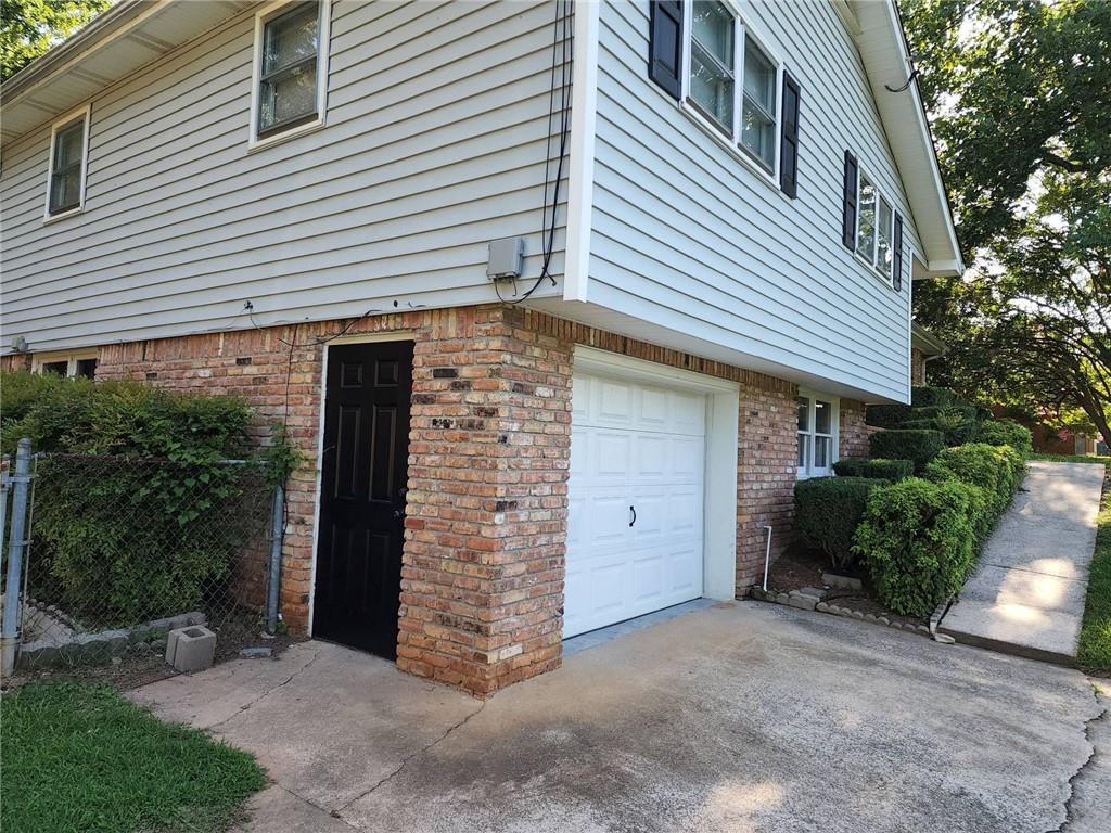 1476 Dupree Road Woodstock, GA 30189 - Photo 2 of 26 a view of a house with a yard and plants