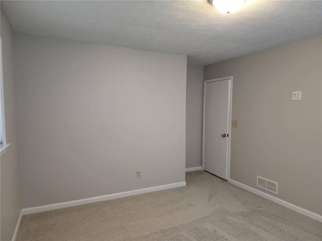 1476 Dupree Road Woodstock, GA 30189 - Photo 26 of 26 a view of an empty room