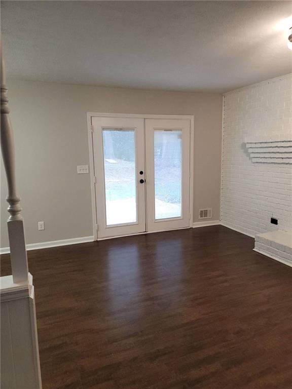 1476 Dupree Road Woodstock, GA 30189 - Photo 8 of 26 a view of wooden floor and windows in a room