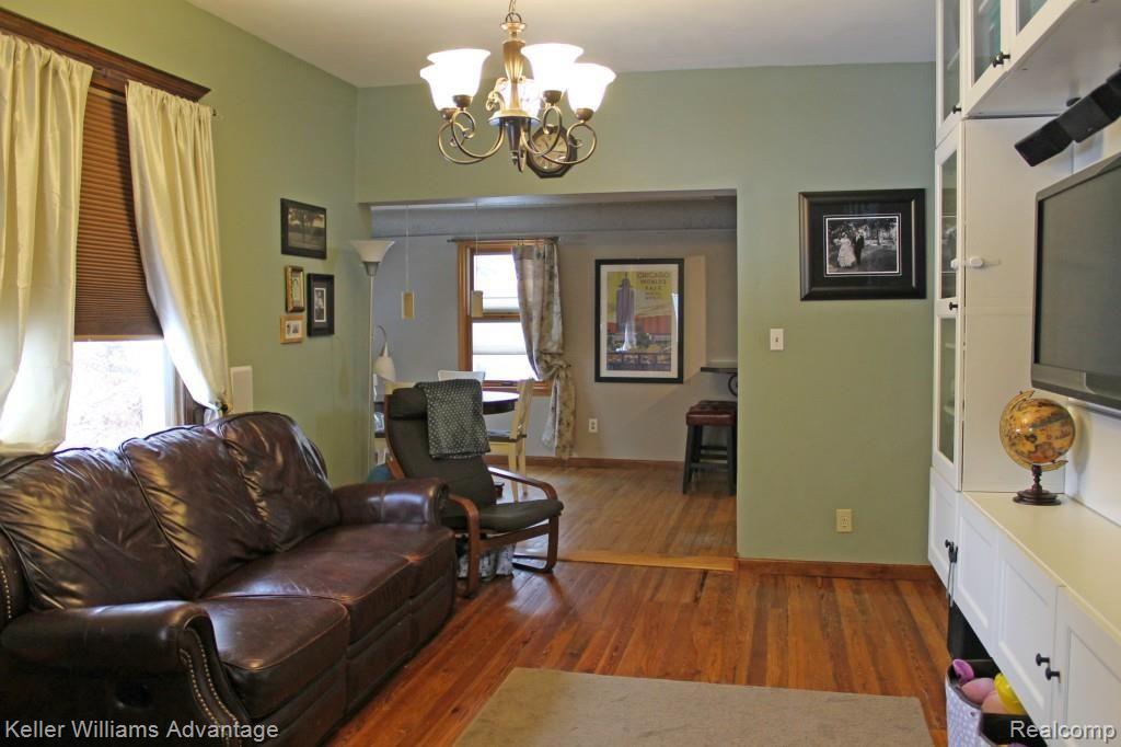 11120 Clinton River Road Sterling Heights, MI 48314 - Photo 7 of 16 Living Room 1.jpg