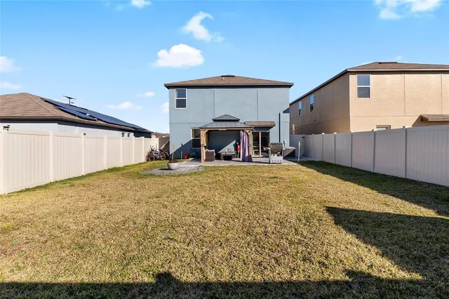 a swimming pool view with a outdoor space