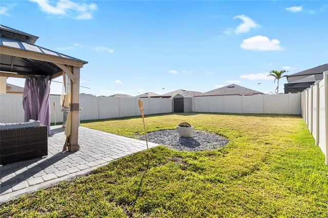 a view of a swimming pool with an outdoor space