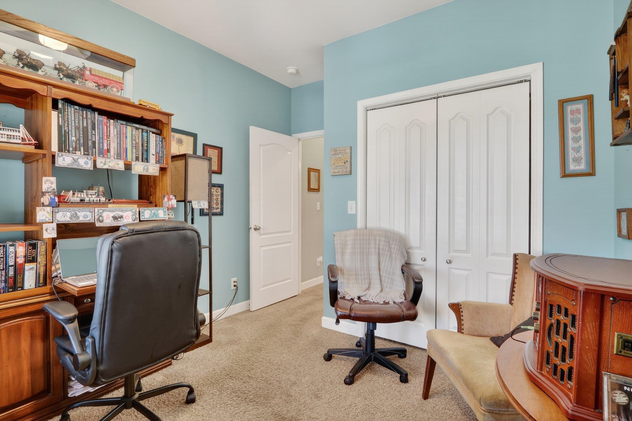 3721 Green Tree Lane DeKalb, IL 60115 - Photo 19 of 20 a living room with furniture and a chair