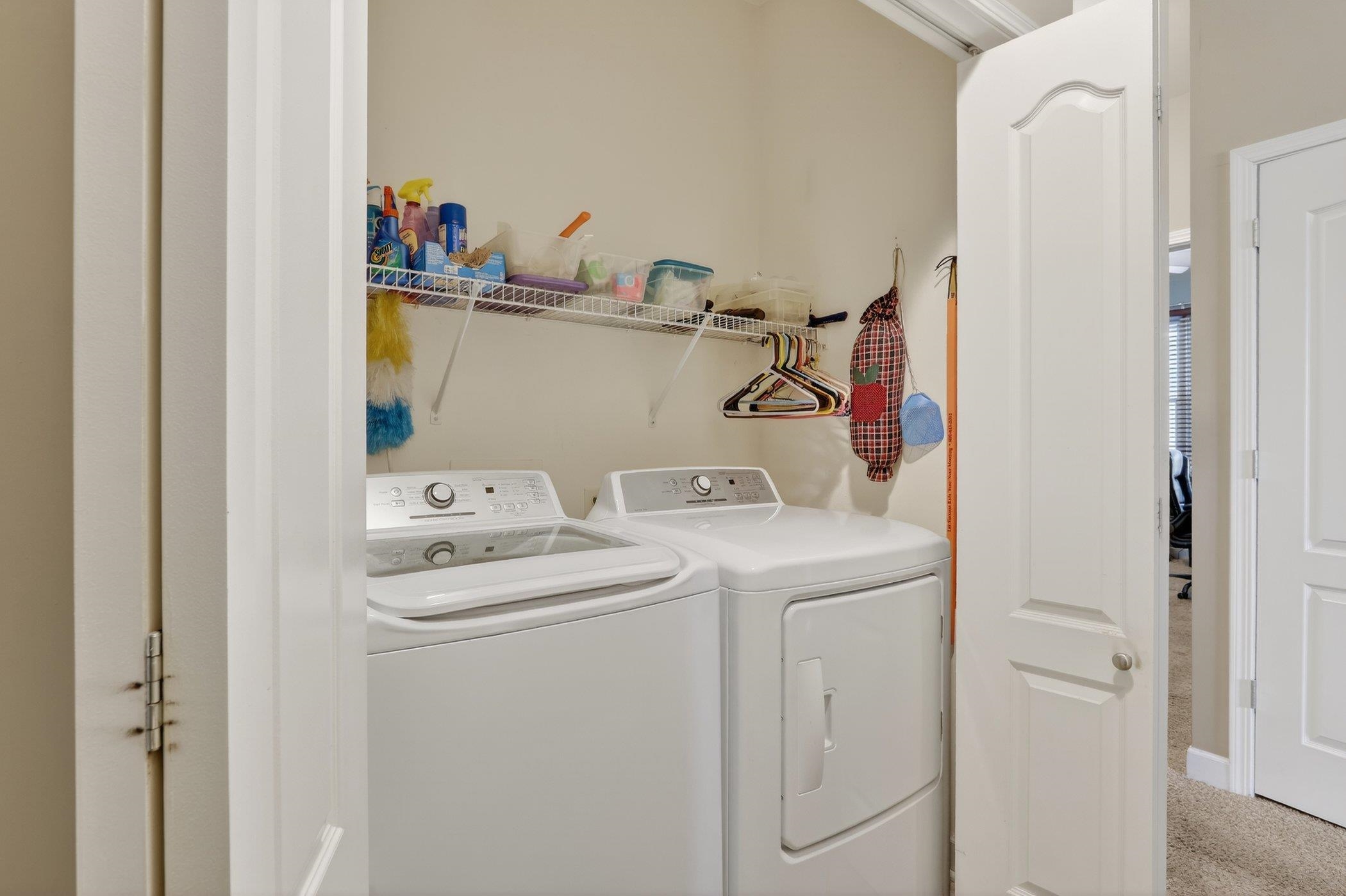 3721 Green Tree Lane DeKalb, IL 60115 - Photo 20 of 20 a utility room with dryer and washer