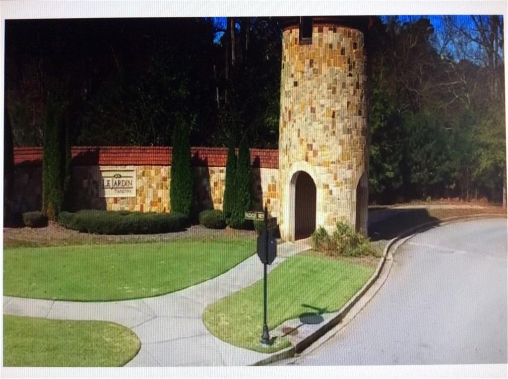 709 Giverney Way Fairburn, GA 30213 - Photo 12 of 12 a front view of a house with garden