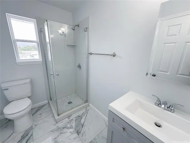 a view of a kitchen with a sink and cabinet area
