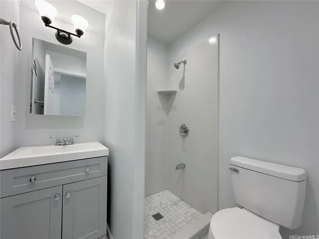 a bathroom with a sink and shower