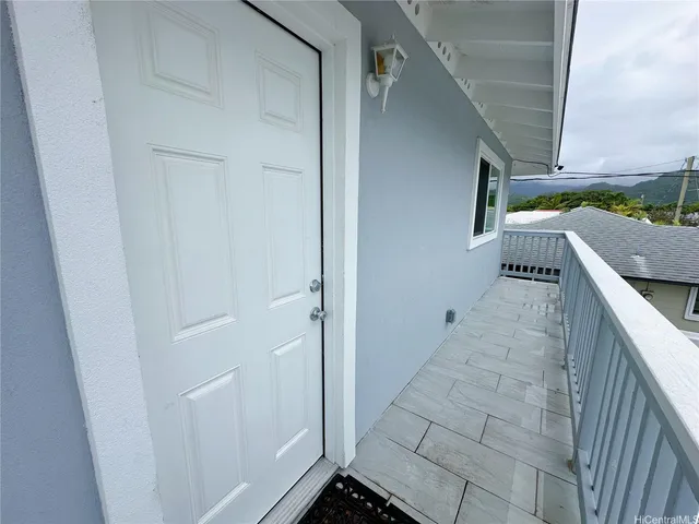 a view of kitchen with furniture and window
