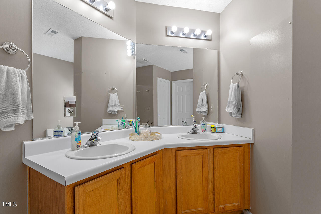 689 Seastone Street Raleigh, NC 27603 - Photo 15 of 34 Primary bath