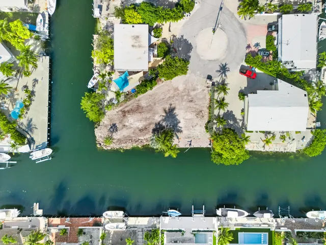 an aerial view of a house with a garden