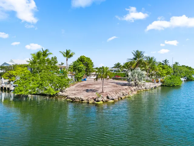 a view of an ocean with a house