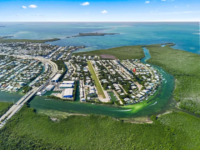 a view of a golf course with a lake