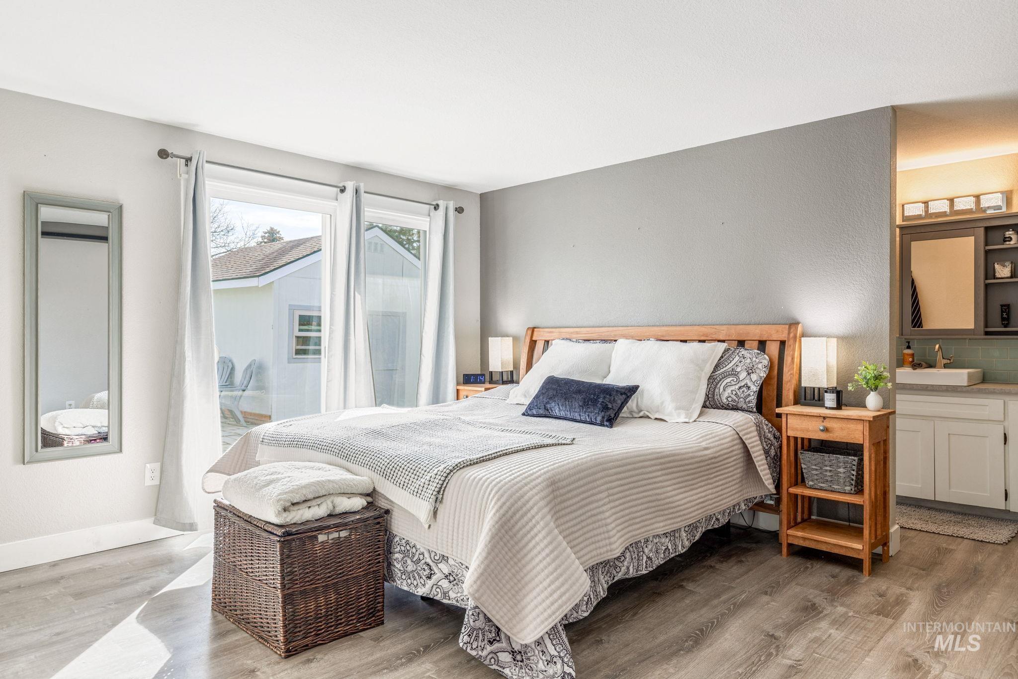 3209 Whitman Drive Boise, ID 83716 - Photo 20 of 45 Bedroom with light wood-style floors