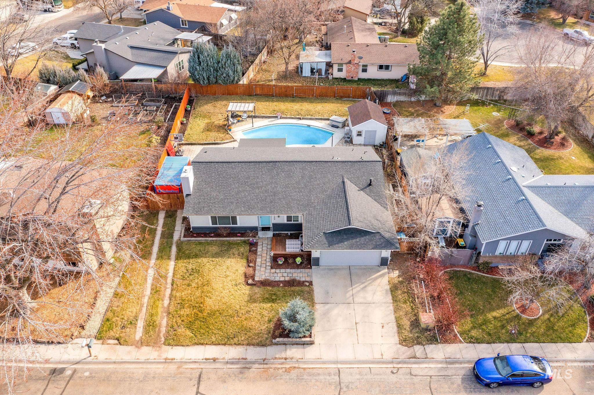 3209 Whitman Drive Boise, ID 83716 - Photo 40 of 45 Aerial perspective of suburban area featuring a pool area