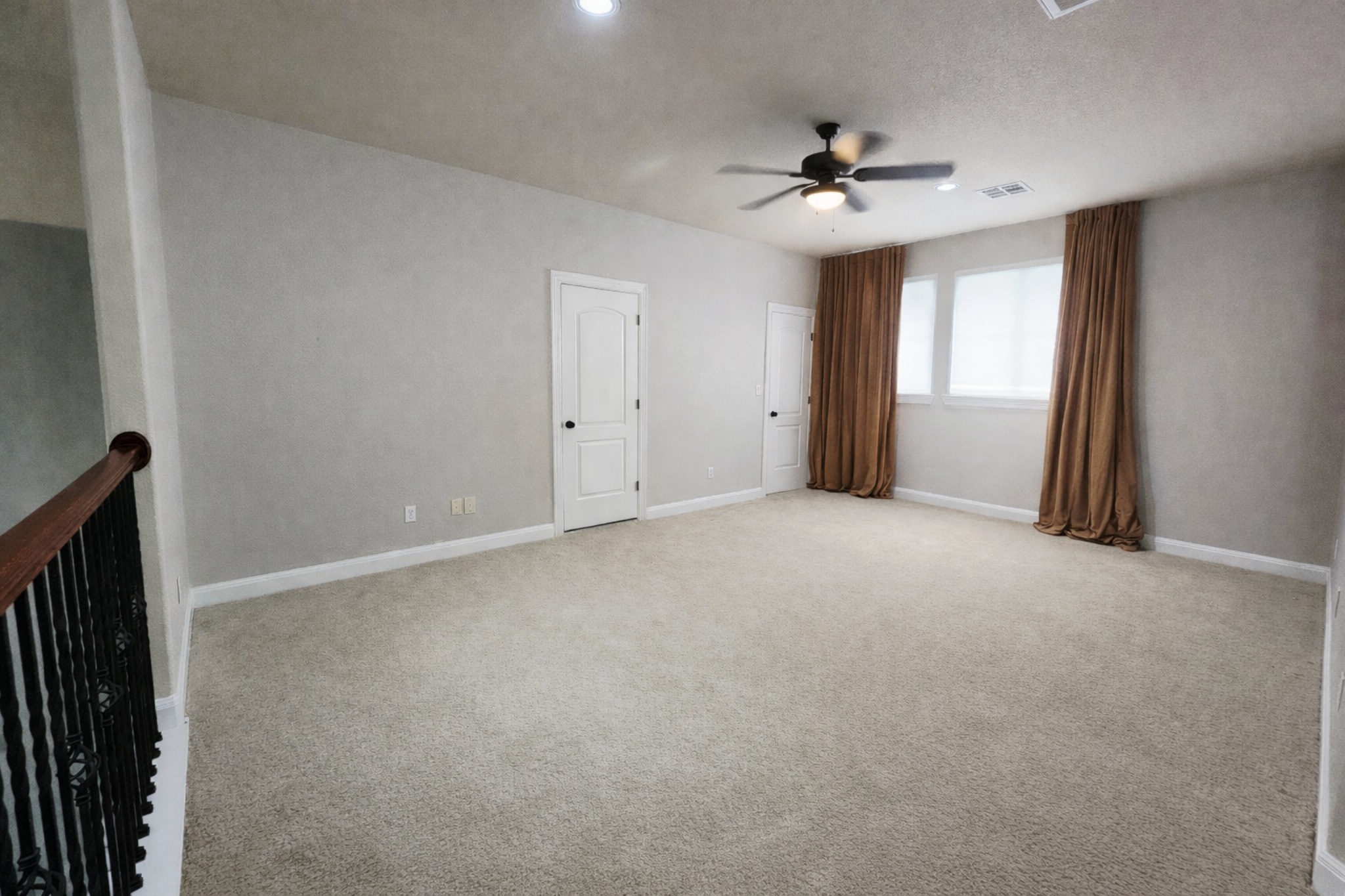 152 Silver Hawk Court Dripping Springs, TX 78620 - Photo 18 of 31 a view of a livingroom with a ceiling fan and window