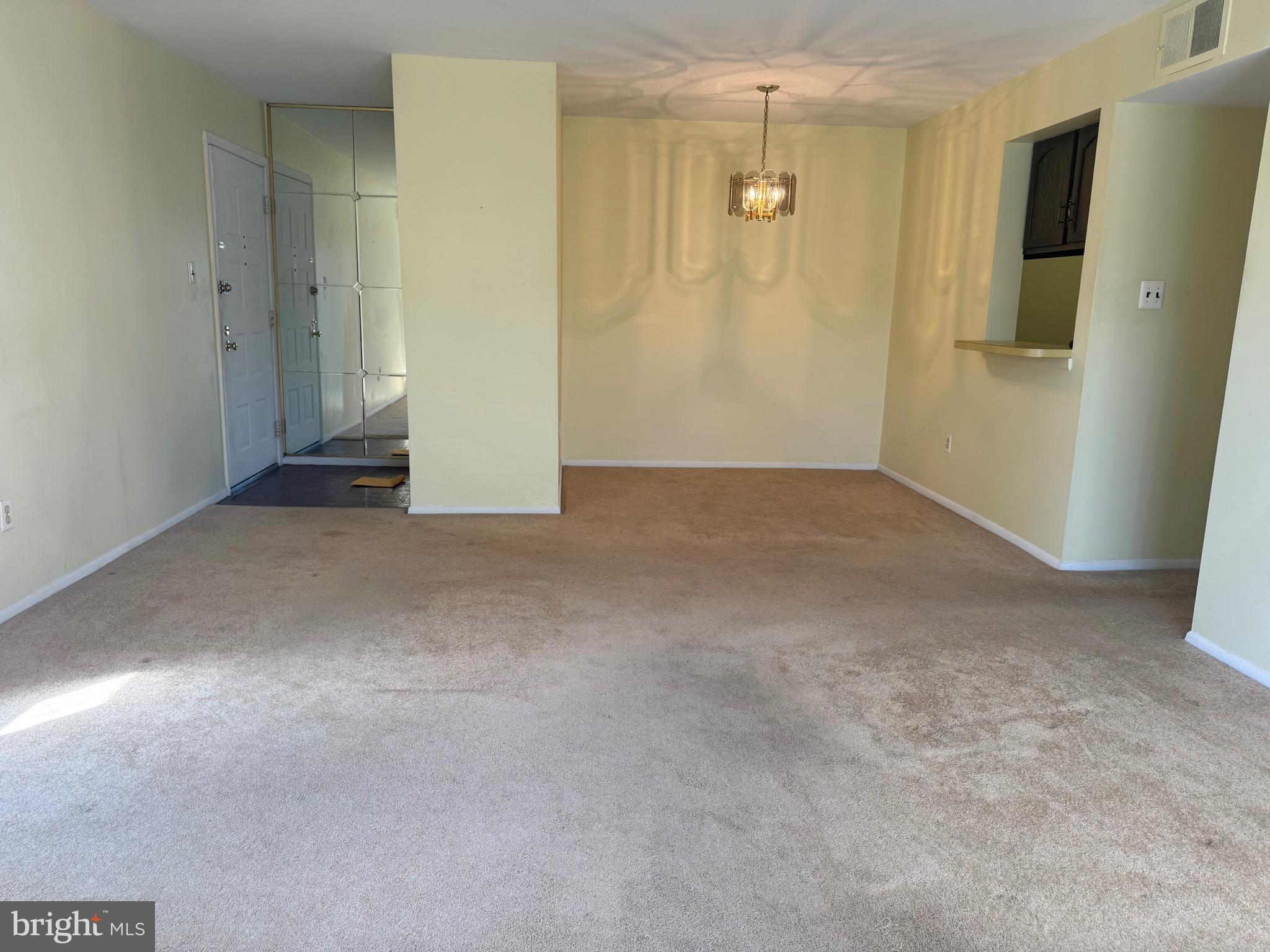 25 Church Road, Unit 184 Maple Shade, NJ 08052 - Photo 8 of 9 a view of a big room with closet and wooden floor