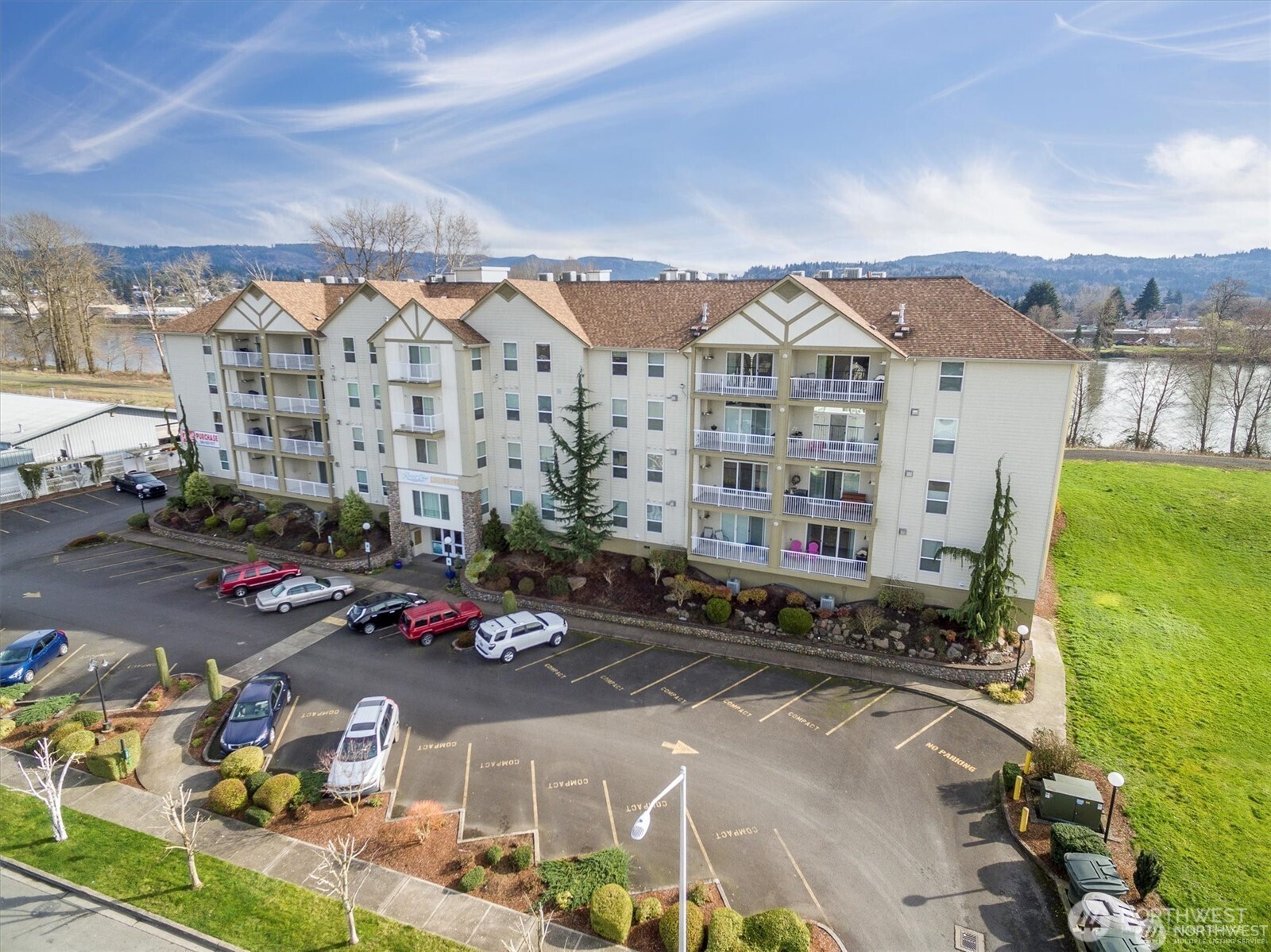 1548 River Road, Unit 209 Longview, WA 98632 - Photo 1 of 24 a view of a city that has tall buildings
