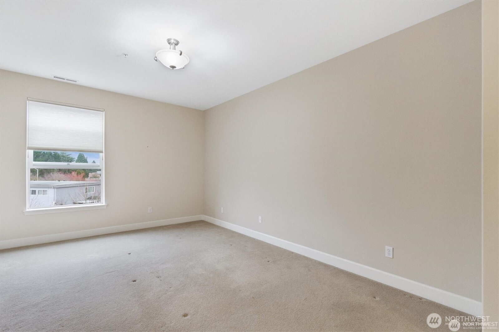 1548 River Road, Unit 209 Longview, WA 98632 - Photo 18 of 24 a view of an empty room with a window
