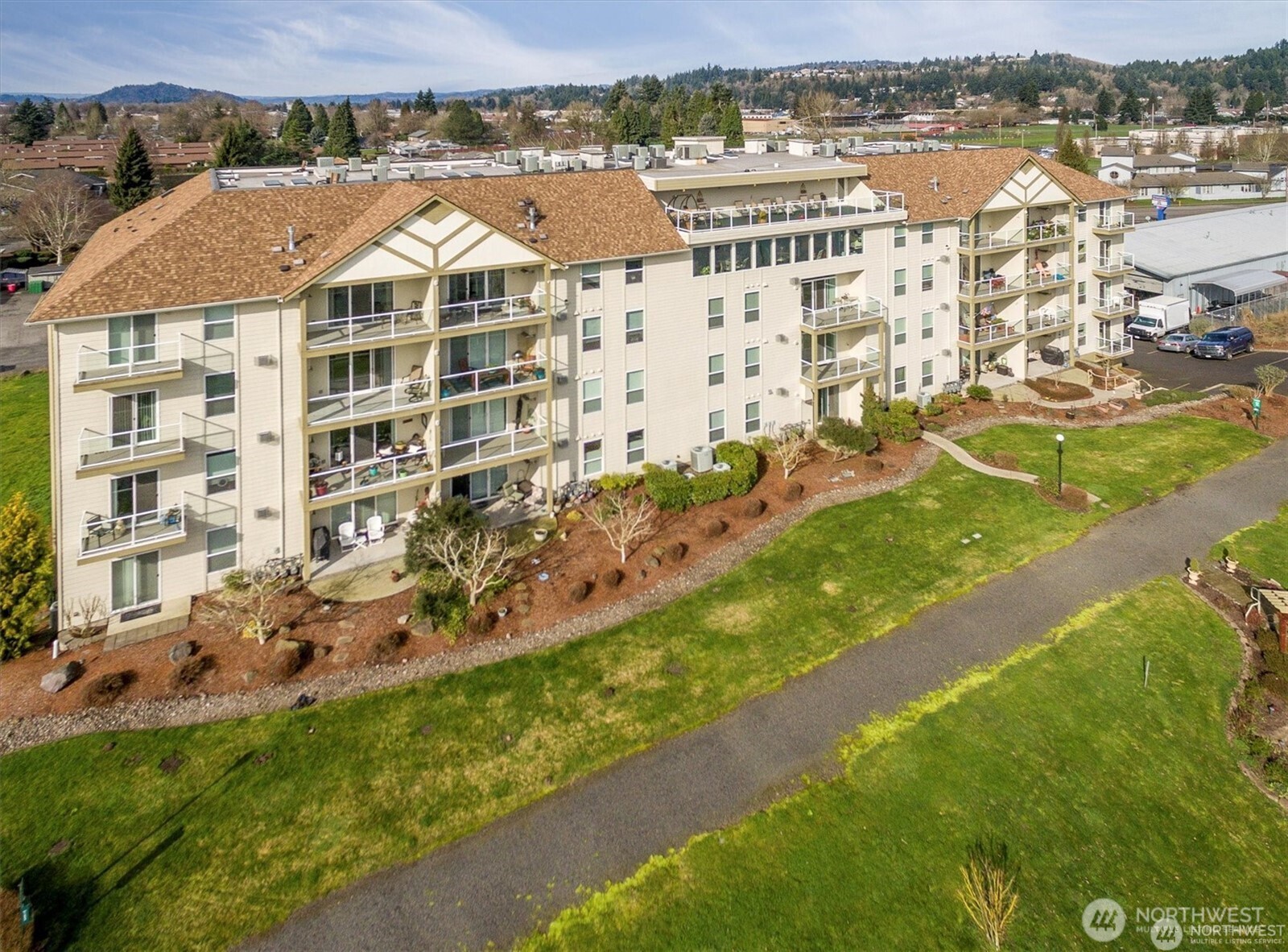 1548 River Road, Unit 209 Longview, WA 98632 - Photo 2 of 24 an aerial view of residential houses with outdoor space and river